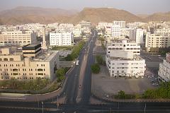 
A few kilometres inland from Muscat and Mutrah is Ruwi, the capital's modern commercial district. Ruwi is surrounded by rocky mountains and has beautiful scenery. Here is a daytime view of Ruwi from our Sheraton room window.
